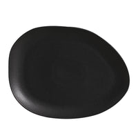 Matte black ceramic plate on a white background