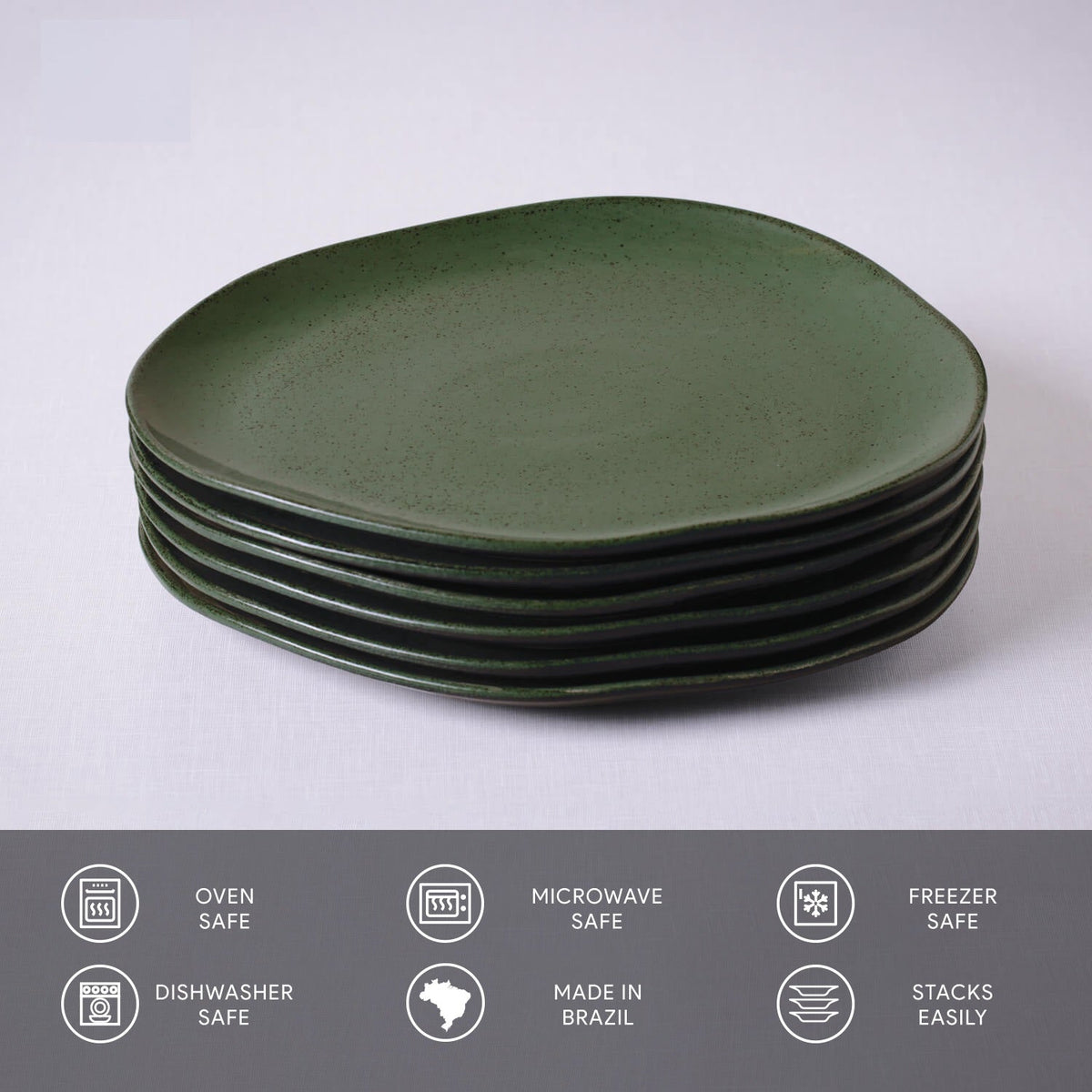 Set of green ceramic plates stacked on a white background with safety and feature icons at the bottom.