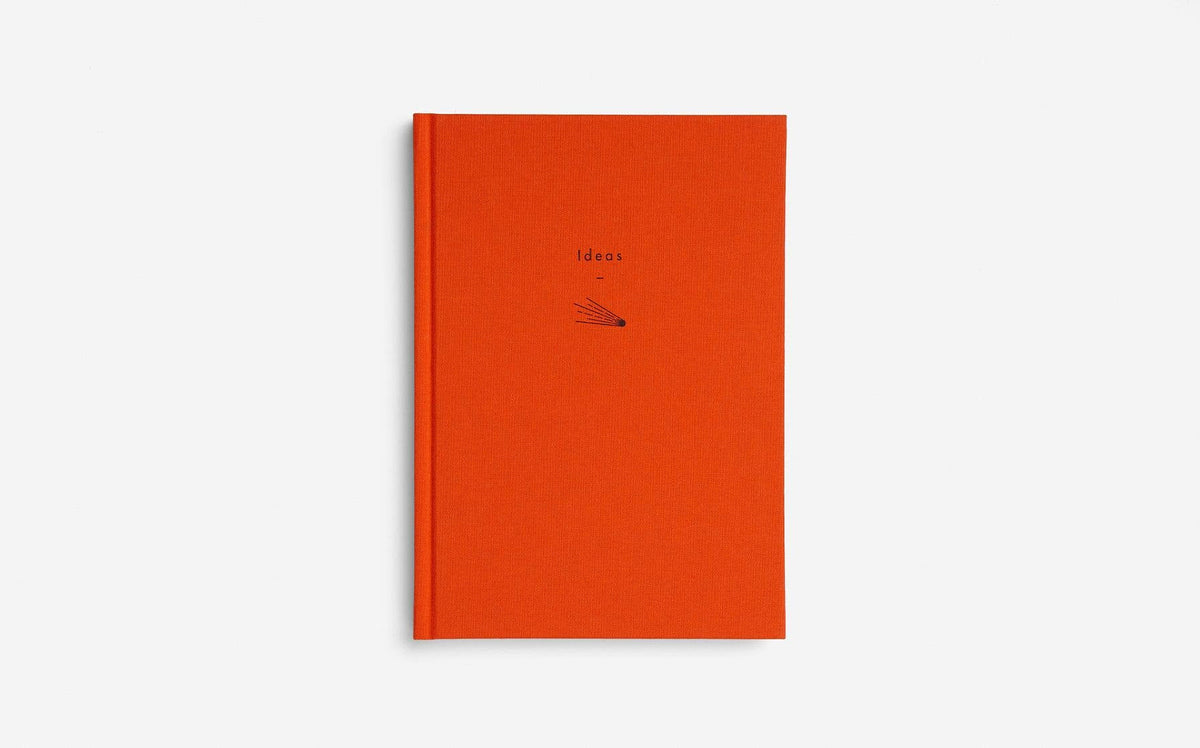 Orange notebook with minimal design and 'Ideas' title on a white background