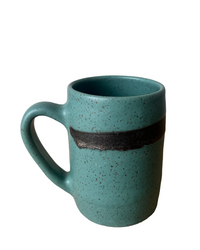 Teal speckled mug with a black stripe on a white background