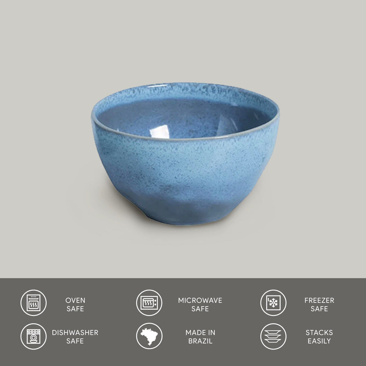 Blue ceramic bowl on a gray background with safety and feature icons at the bottom.