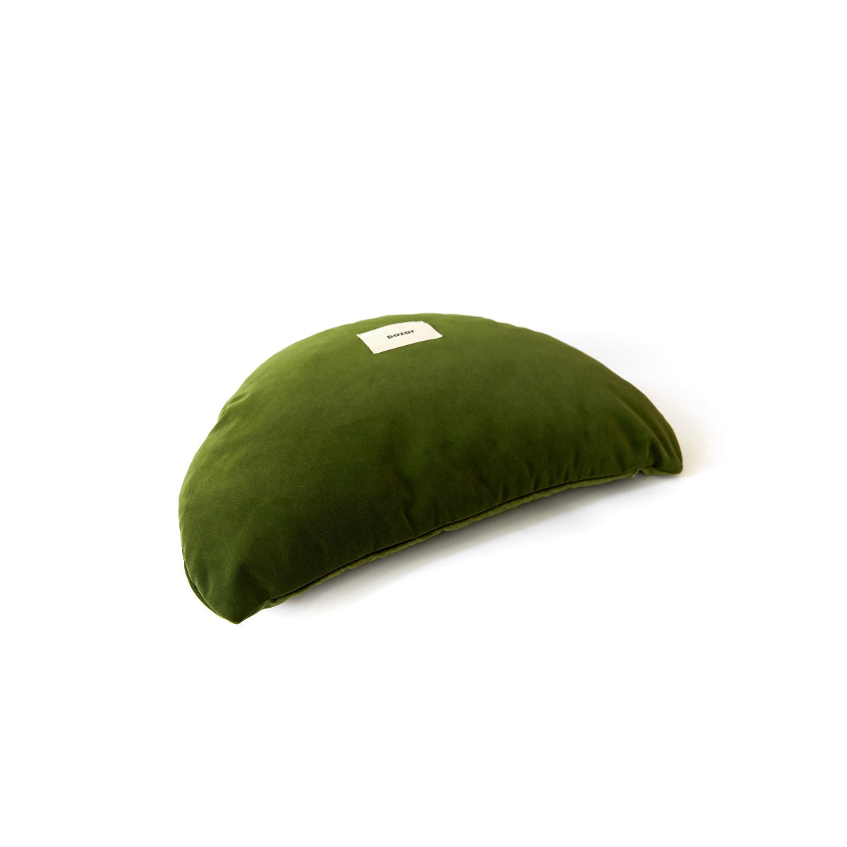 Green cushion with a label on a white background