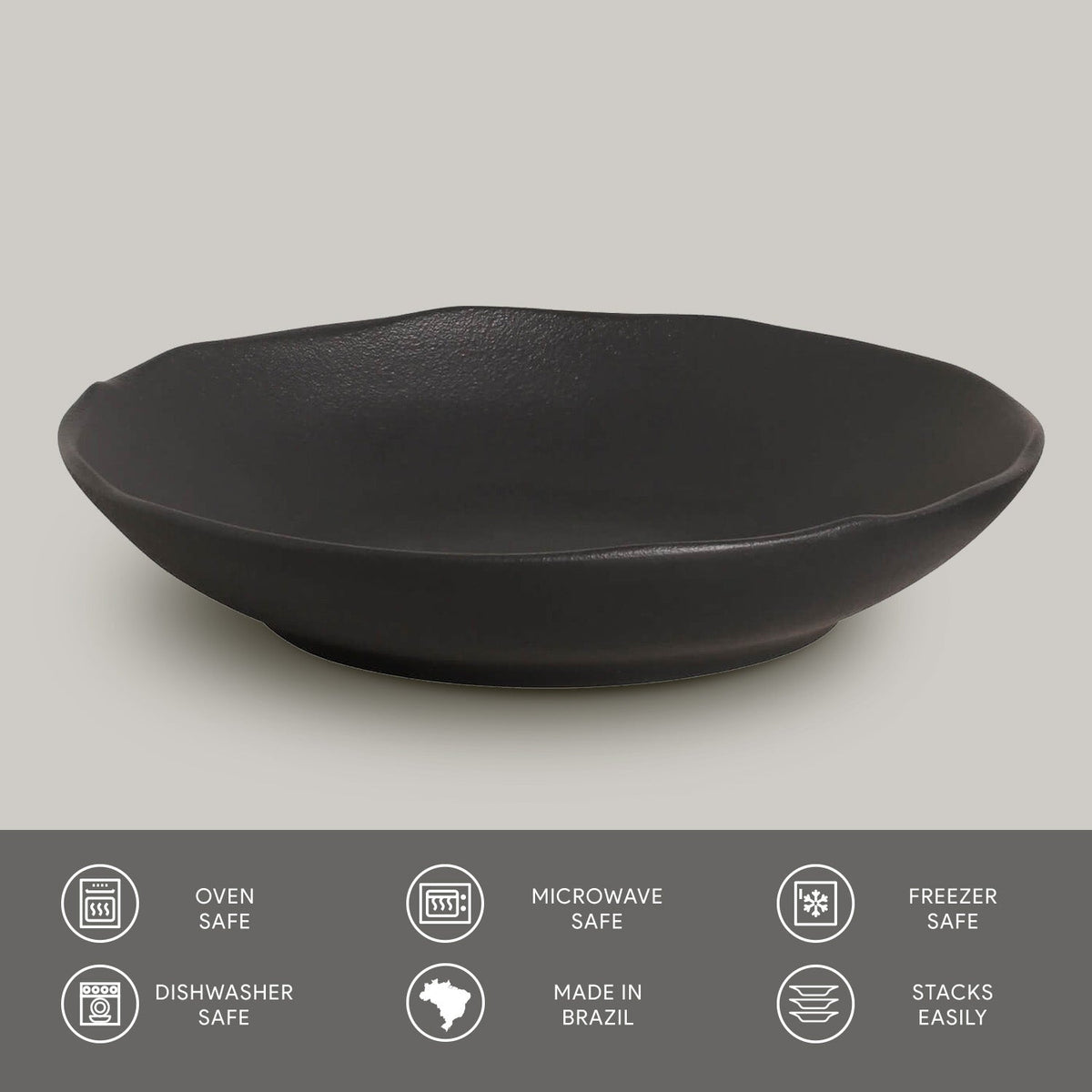 Black ceramic pasta plate on a light gray background with safety and feature icons at the bottom.