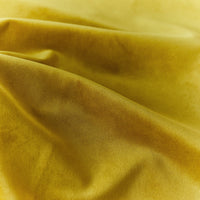 Close-up of yellow fabric with folds