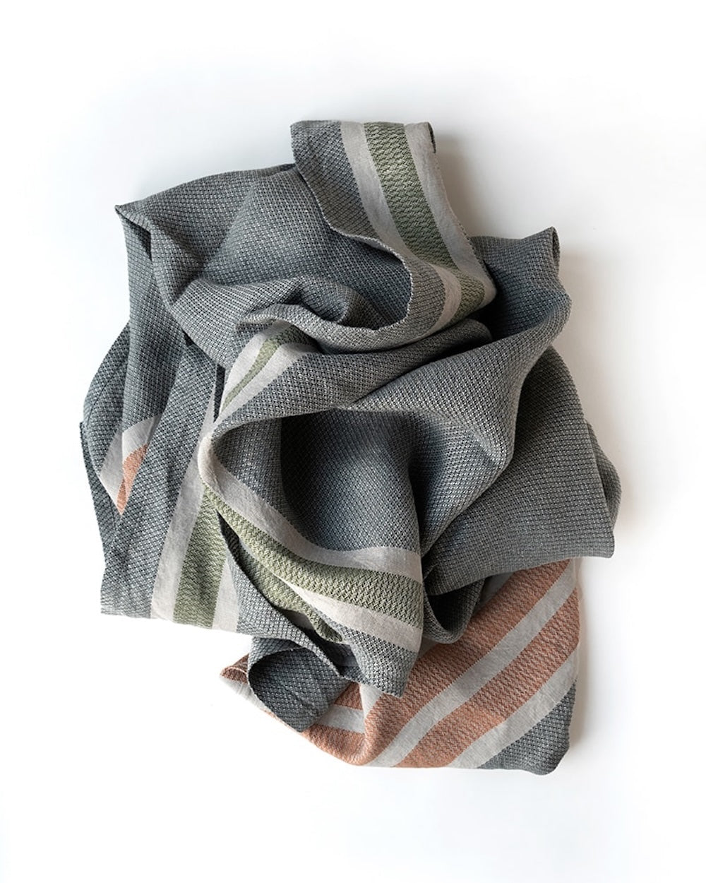 Folded towel with striped pattern on a white background