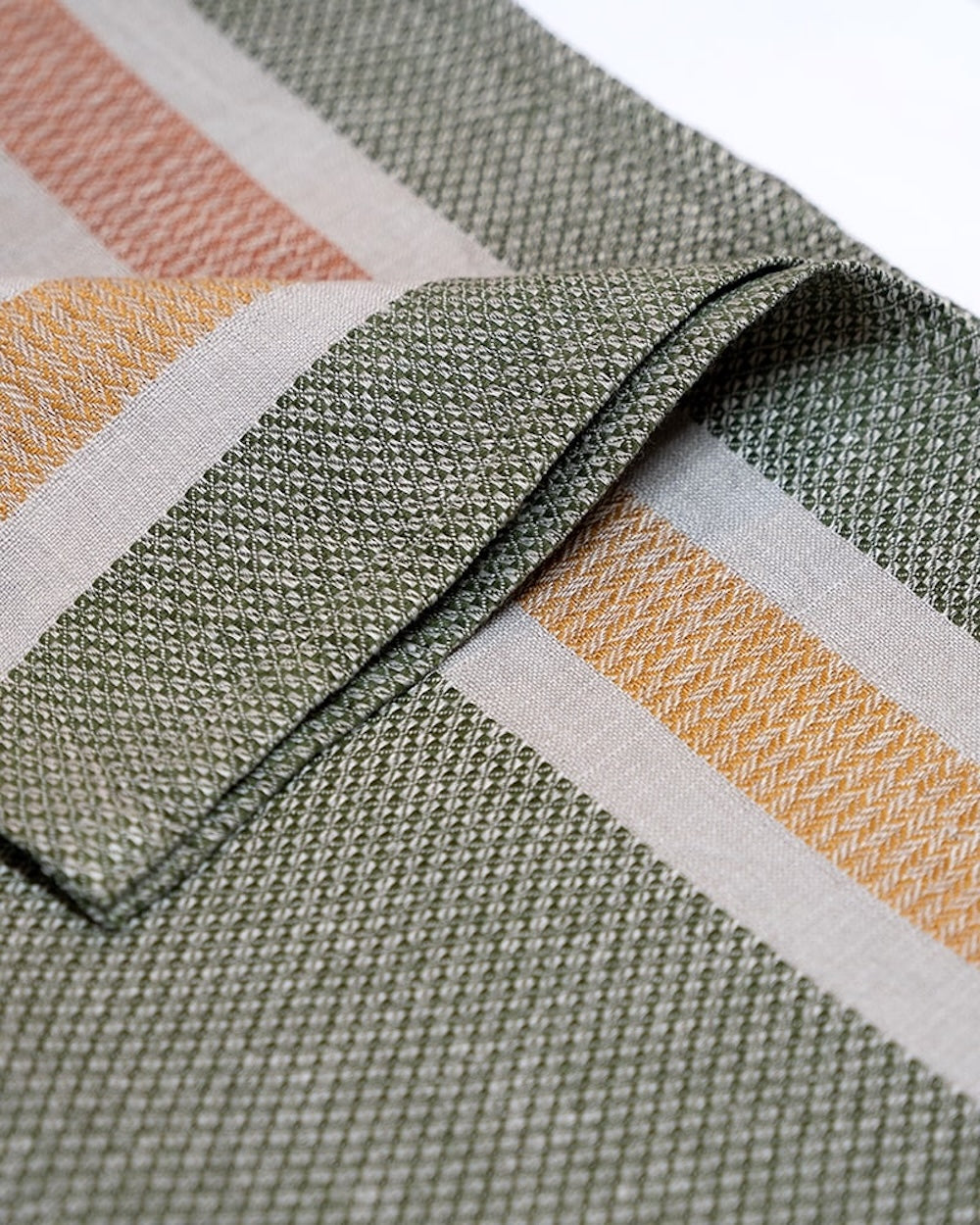 Close-up of a textured towel fabric with geometric pattern