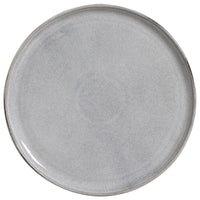 Round gray ceramic plate on a white background
