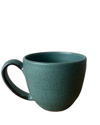 Speckled teal mug on a white background