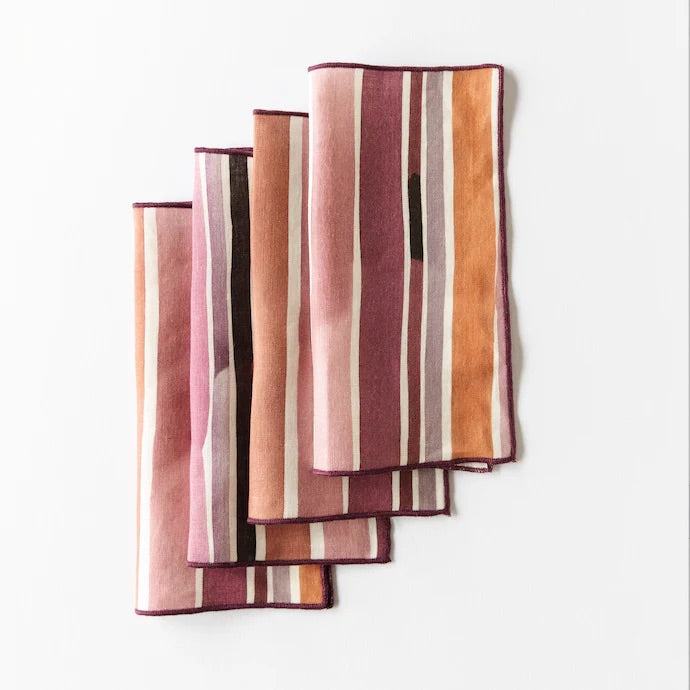 Set of striped napkins in various colors on a white background