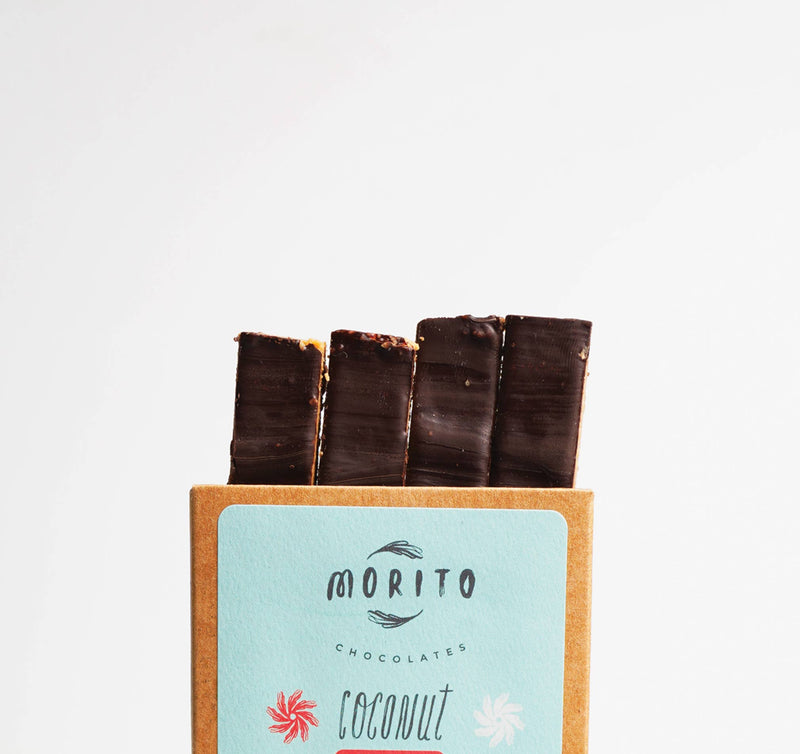 Box of Morito Chocolates coconut sticks on a light gray background