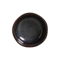 Dark ceramic bowl on a white background