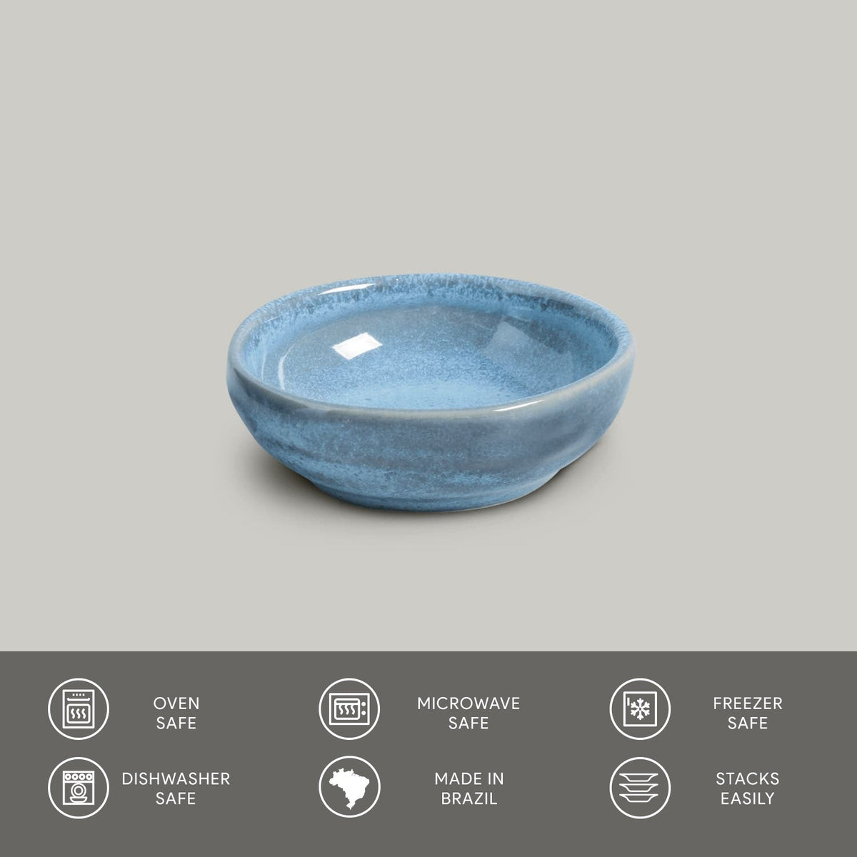 Blue ceramic bowl on a gray background with safety and feature icons at the bottom.