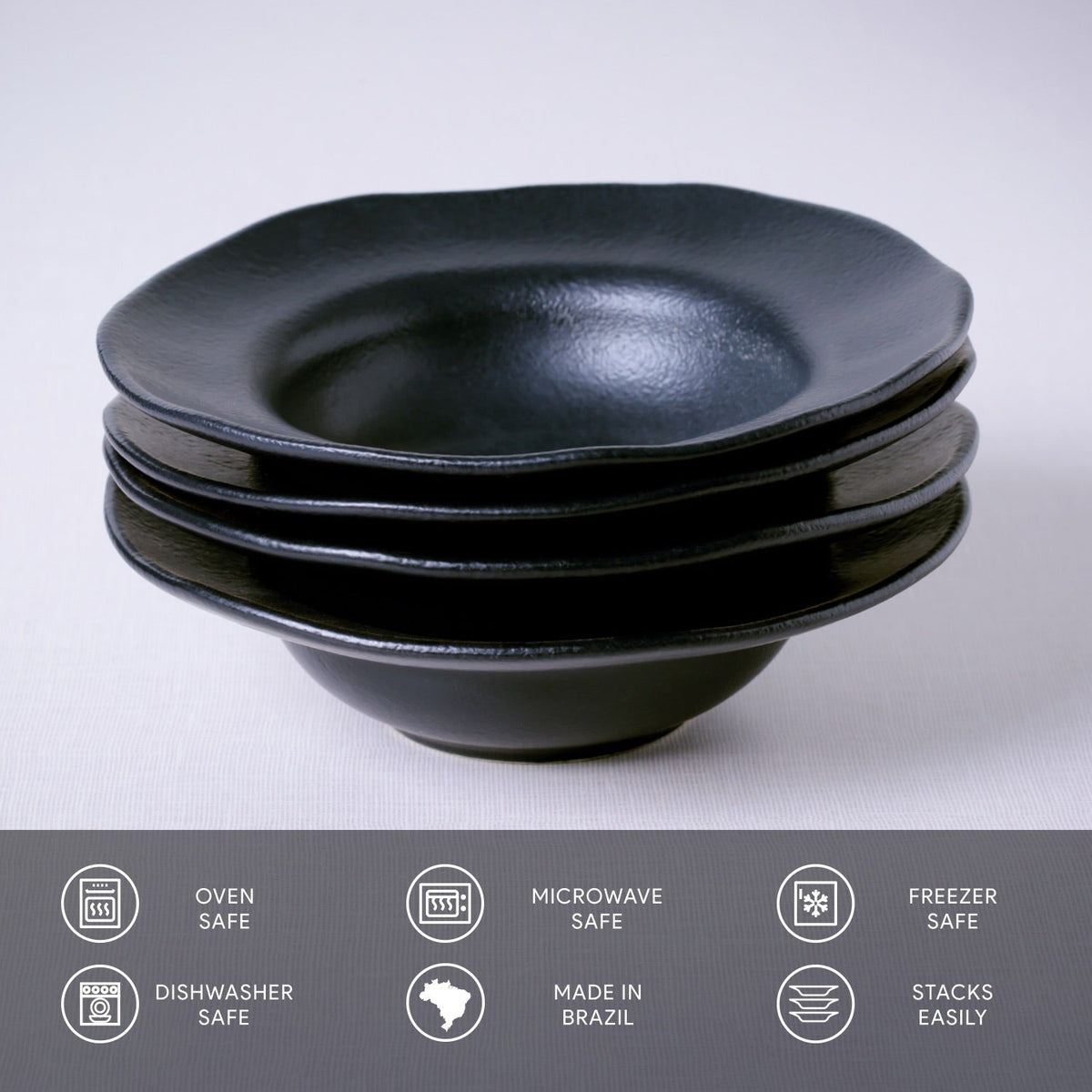 Stack of black bowls on a light gray background with safety and feature icons at the bottom.