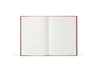 Open notebook with lined pages on a white background