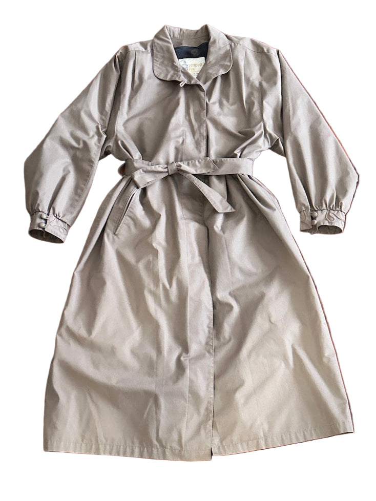 Taupe trench coat on a white background