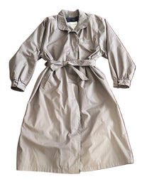 Taupe trench coat on a white background