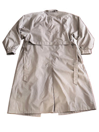 Backside of a taupe trench coat on a white background