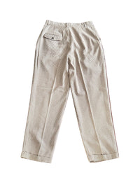 Back of houndstooth pants on a white background