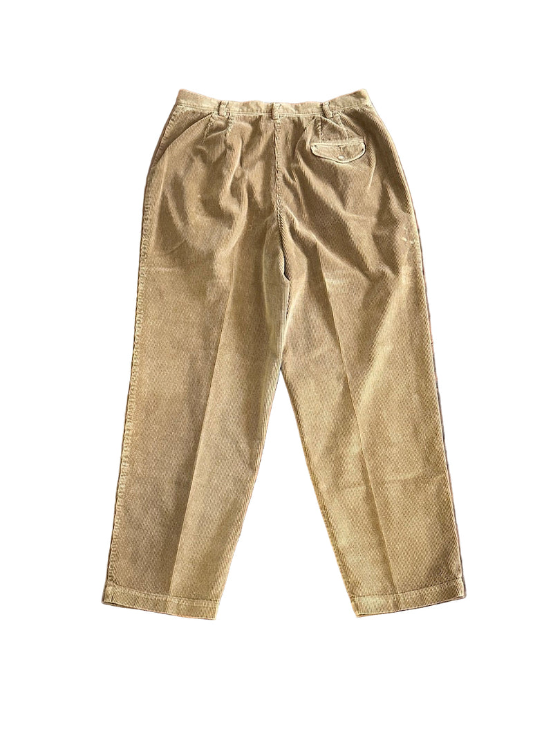 Back of brown corduroy pants on a white background