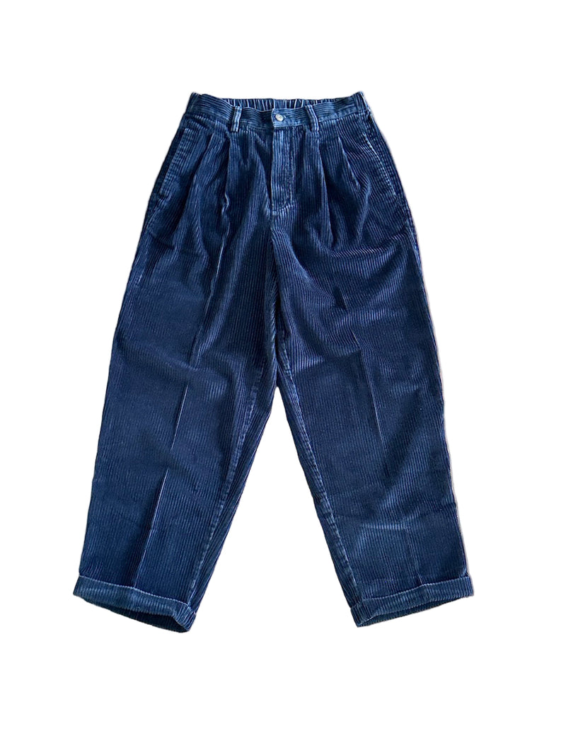Blue corduroy pants on a white background