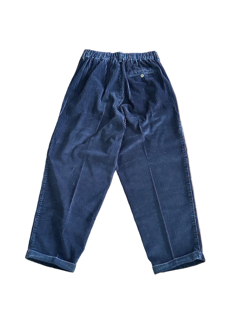 Blue corduroy pants on a white background