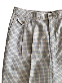 Close up of plaid pants on a white background