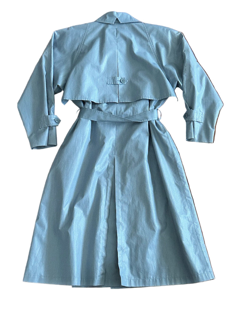 Back of a light blue trench coat on a white background