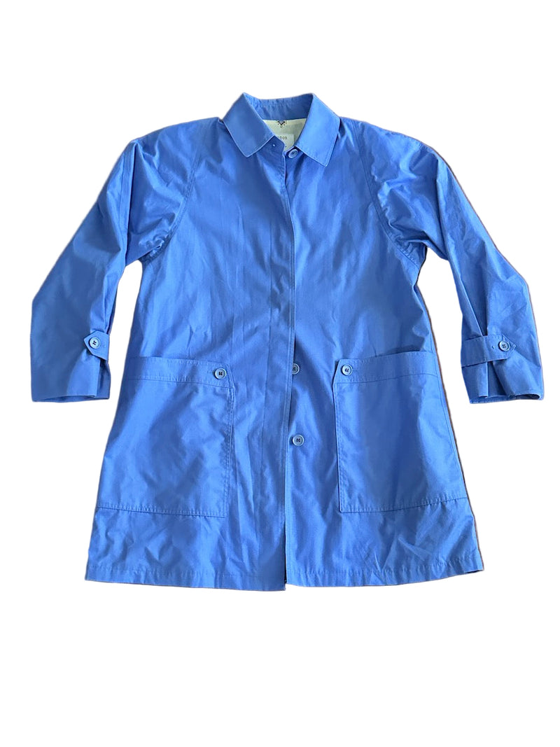 Short blue trench coat on a white background