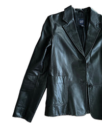 Black leather jacket on a white background with 'GAP' branding.