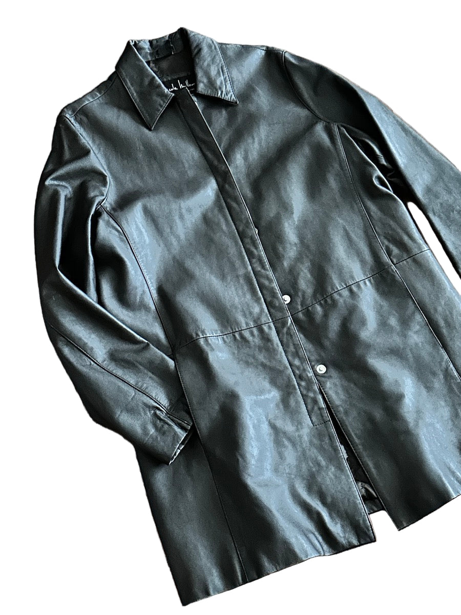 Chocolate brown leather jacket on a white background