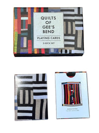 Quilts of Gee's Bend playing cards set on a wooden surface