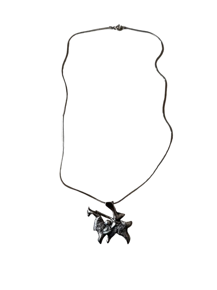 Necklace with a unique pendant on a white background
