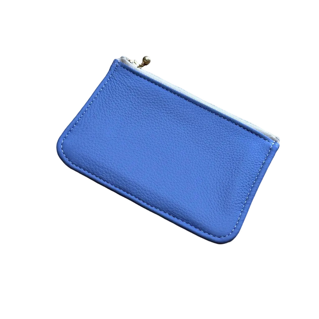 Lilac leather wallet on a white background