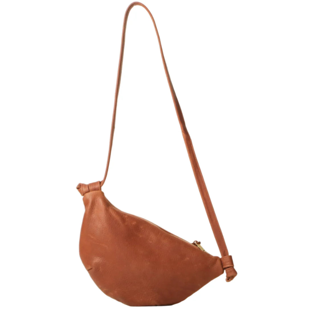 Brown leather shoulder bag on a white background