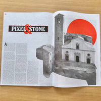 An open magazine or book spread on a light wood surface, featuring the title 'PIXEL & STONE' in black and red text on the left page and a grayscale architectural photograph with a large red sun graphic on the right page.