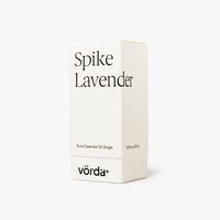 A minimalist white box for Vörda Spike Lavender essential oil, featuring black text on a clean white background.
