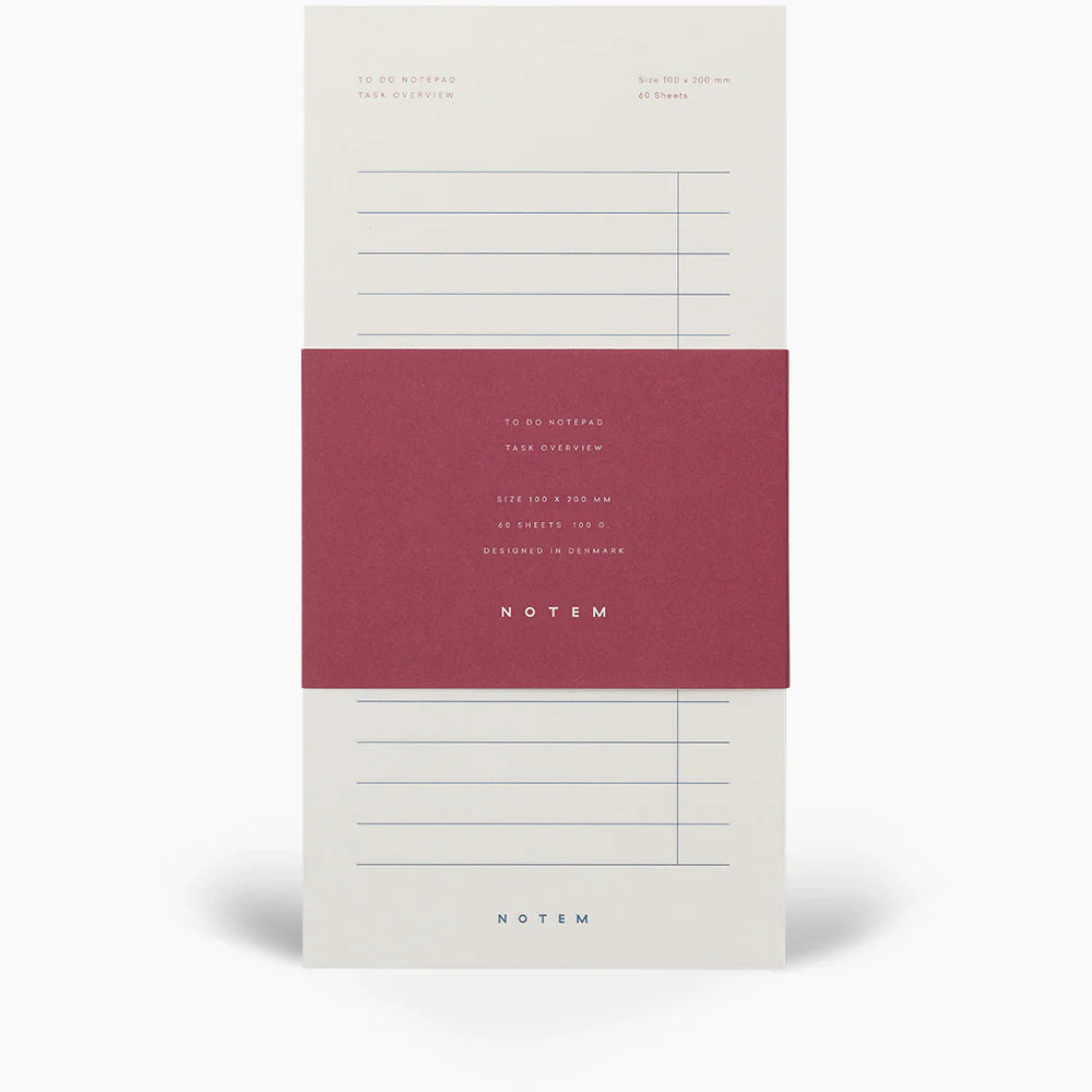 Notepad with a red label and 'NOTEM' branding on a white background