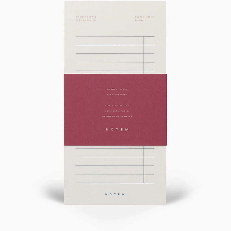 Notepad with a red label and 'NOTEM' branding on a white background