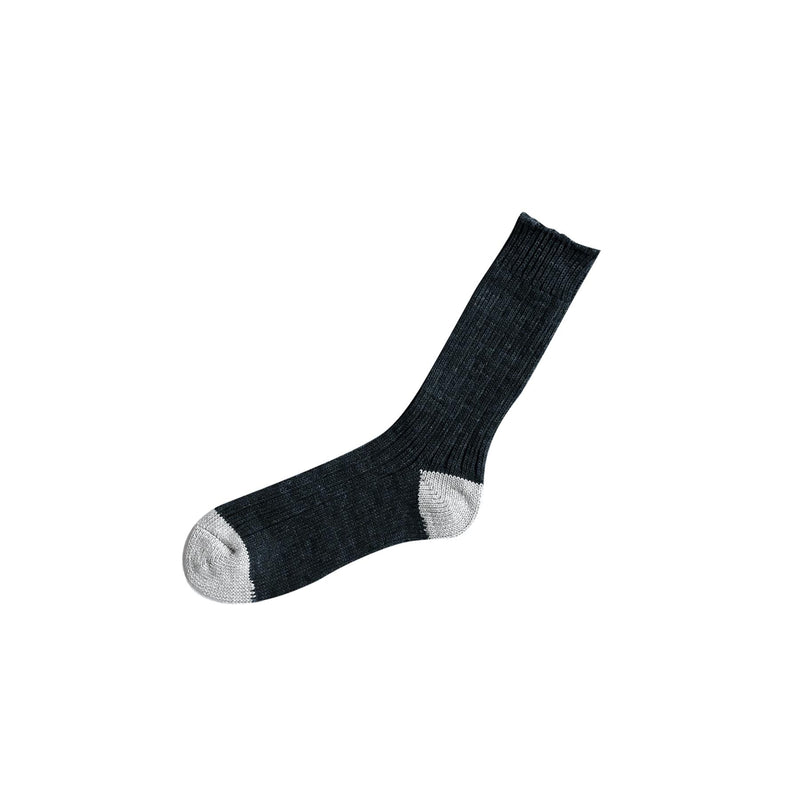 Black sock with gray toe and heel on a white background