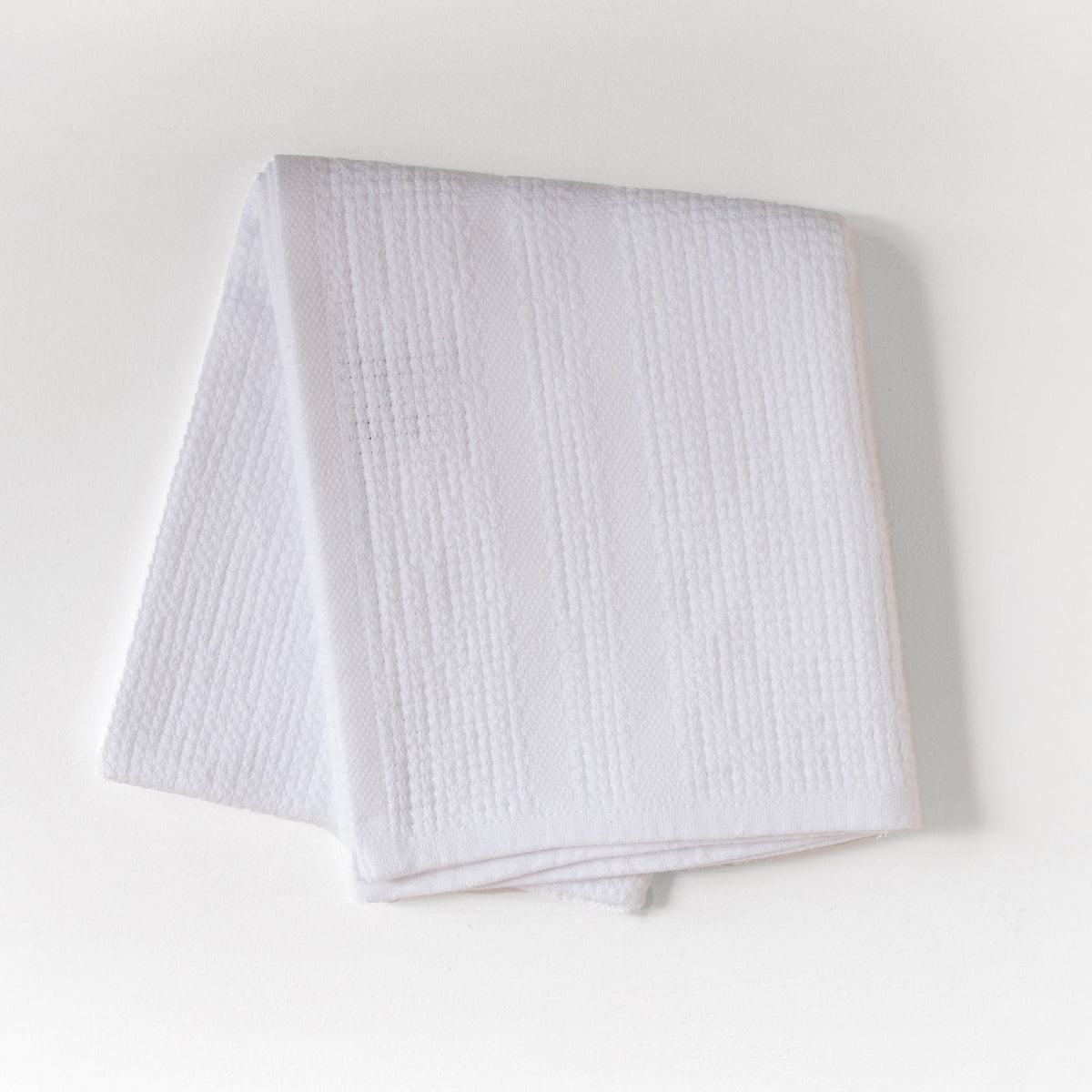 White textured hand towel folded