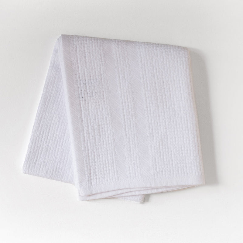 White textured hand towel folded