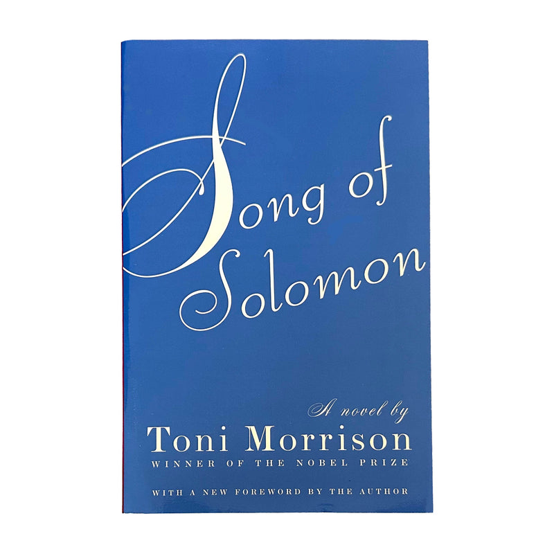 The front cover of the book 'Song of Solomon' by Toni Morrison, featuring a solid blue background with elegant white typography.