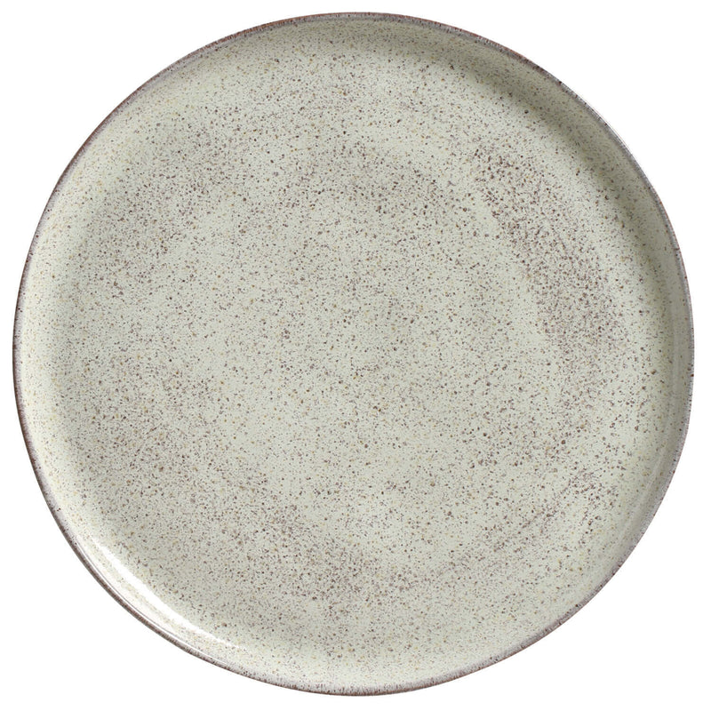 Round ceramic plate with a speckled gray pattern on a white background