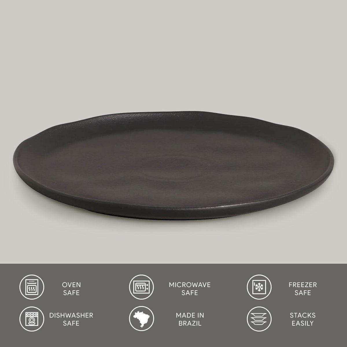 Black round plate on a gray background with safety and feature icons at the bottom.
