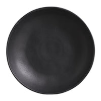 Black ceramic pasta plate on a white background