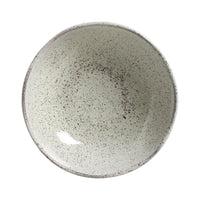 Speckled ceramic bowl on a white background