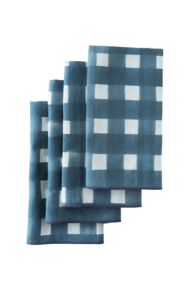 Set of blue checkered napkins on a white background