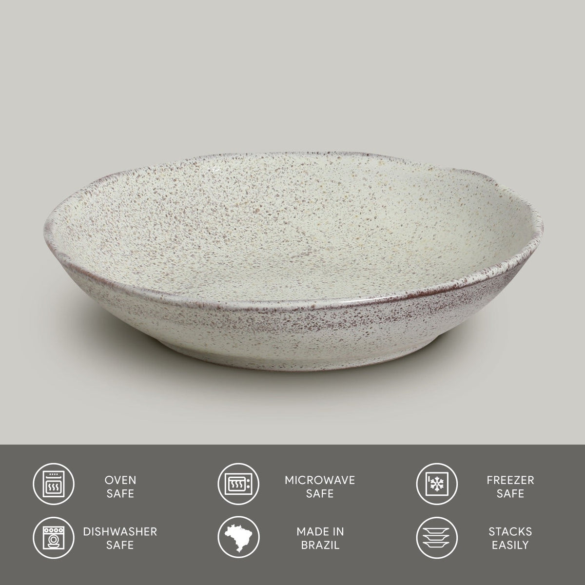 Speckled ceramic pasta plate on a gray background with safety and feature icons at the bottom.