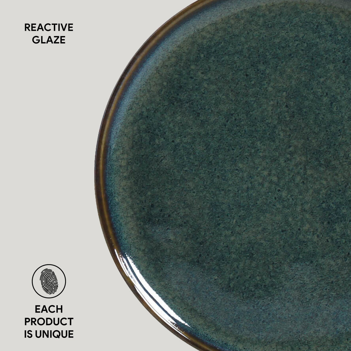 Close-up of a ceramic plate with reactive glaze on a white background