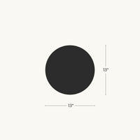 Black circle with measurement label indicating a 13 inch diameter on a white background